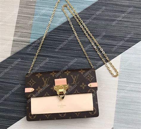 louis vuitton wallet chain cheap|louis vuitton vavin chain wallet.